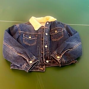 Girls extra large, jean jacket with fuzz on the inside